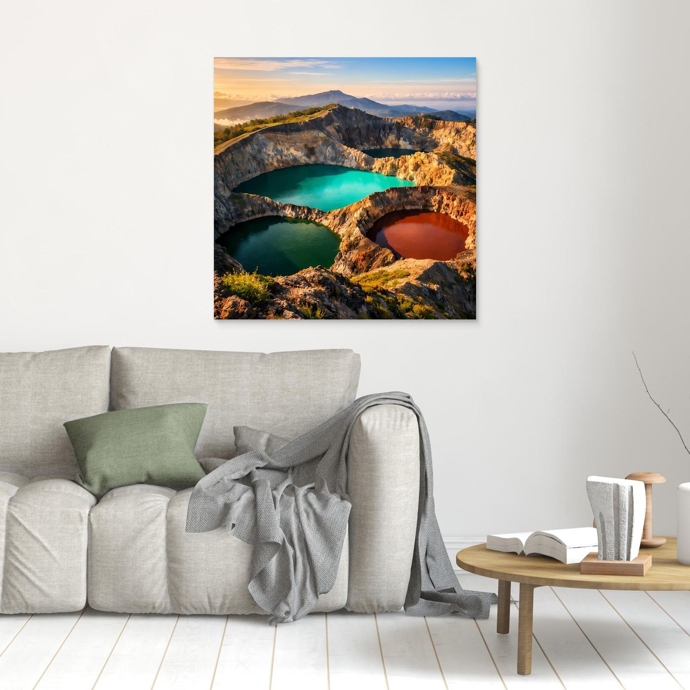 Leinwandbild mit Vulkankratern und drei farbigen Seen: türkis, dunkelgrün und orange-rot, klein an der Wand.
