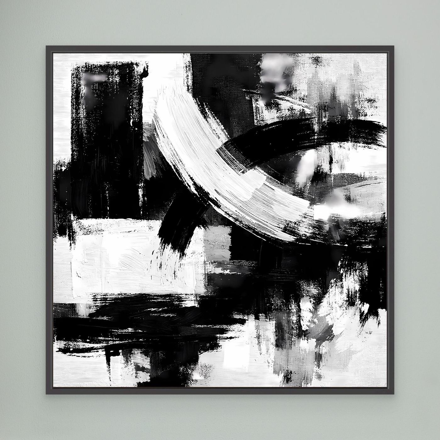 Abstract canvas wall art with black and white brush strokes, in a dark frame