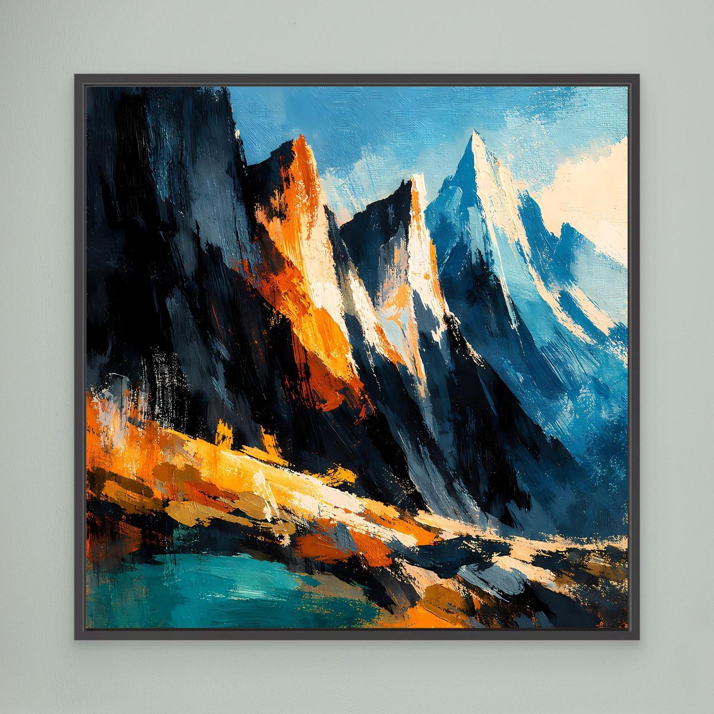 Wandbild mit abstrakten Bergspitzen in Blau, Schwarz und Orange, schwarz gerahmt