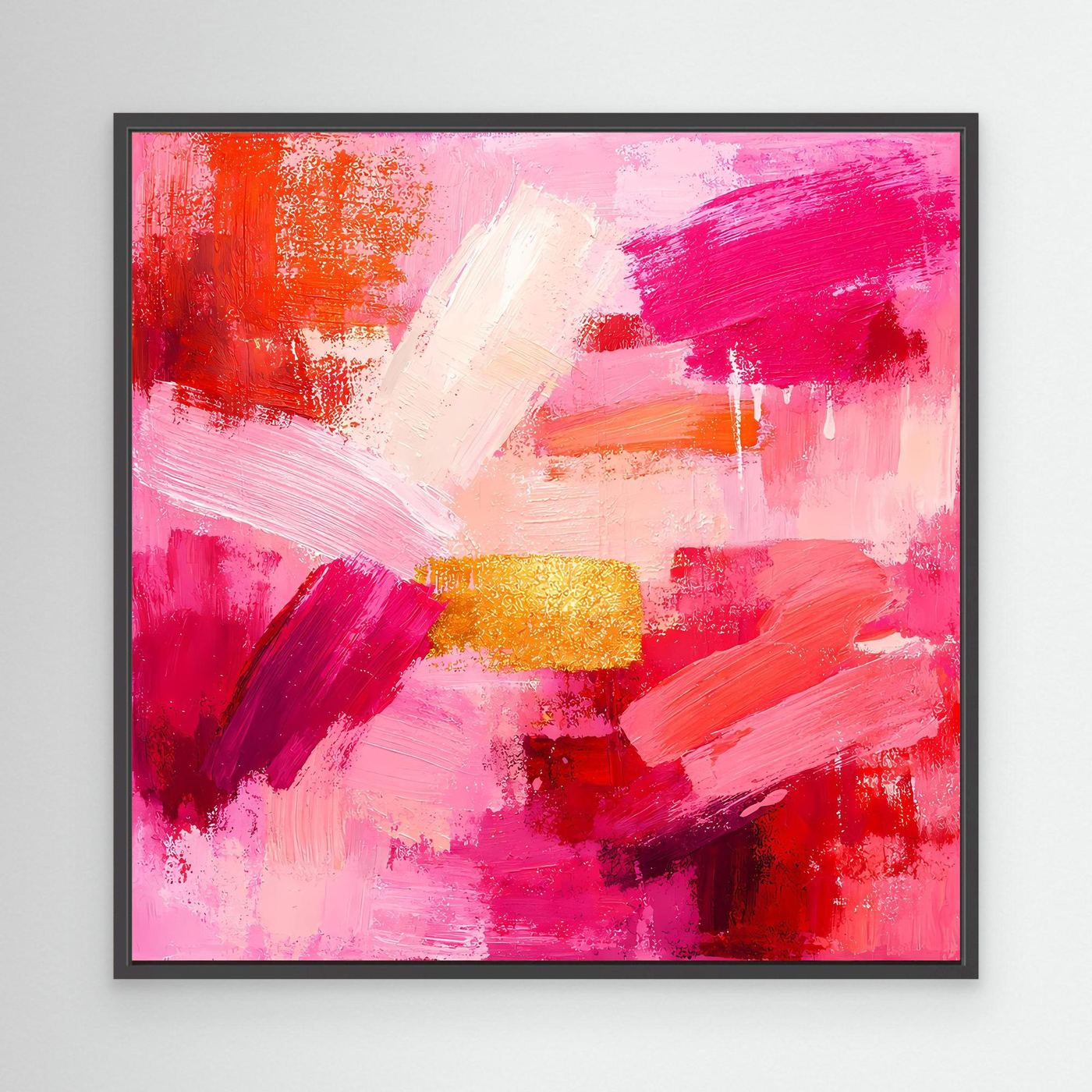 Abstract canvas wall art with pink and orange brushstrokes and gold accent, in a black frame.