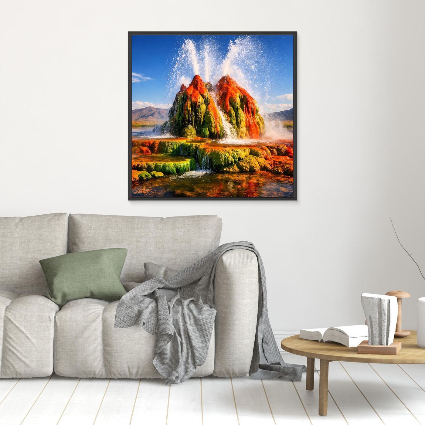 Gerahmtes Leinwandbild mit Geysir-Fontänen über Landschaft in Grün, Orange und Blau