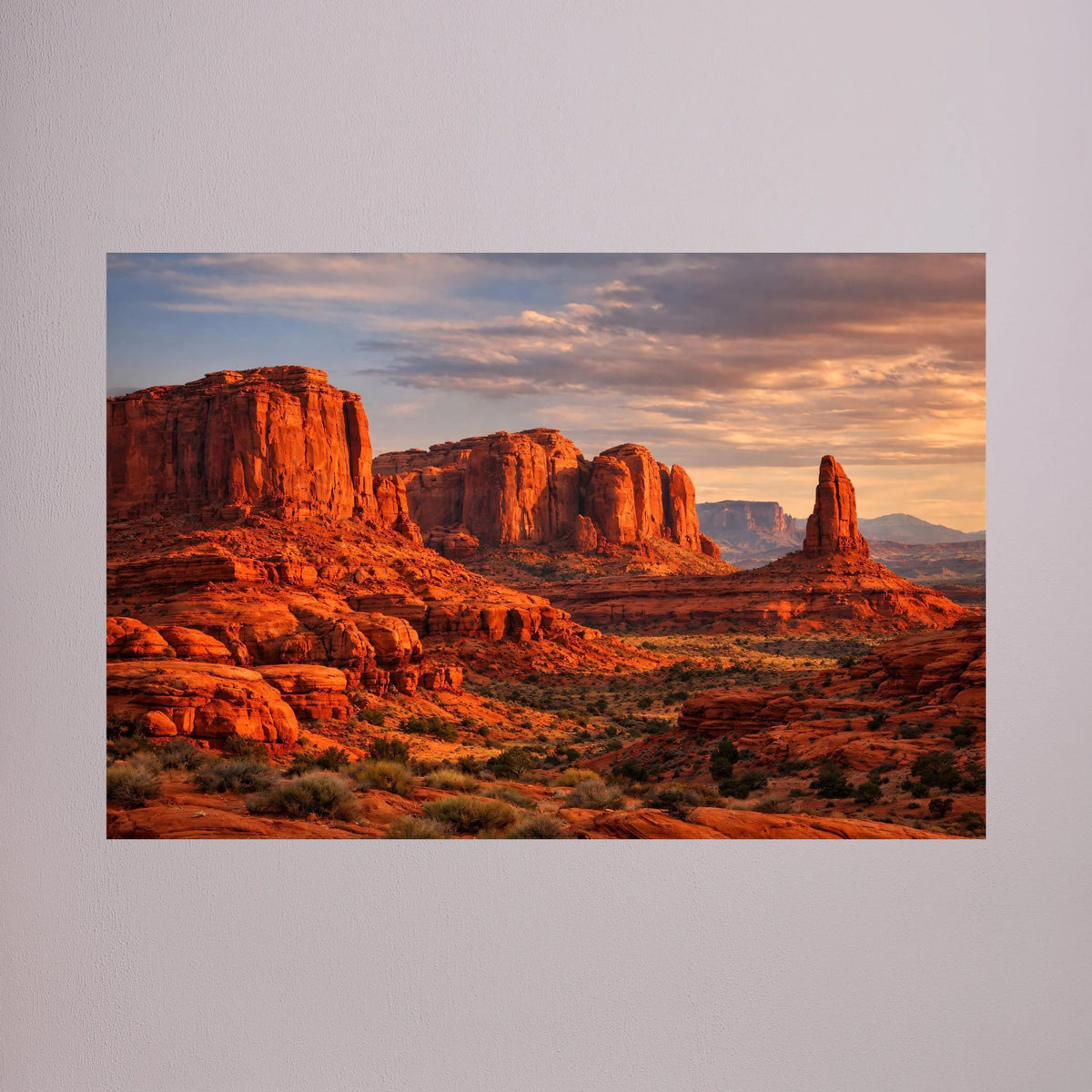 Wandbild (Querformat) mit roten Felsformationen im Abendlicht, ungerahmt.