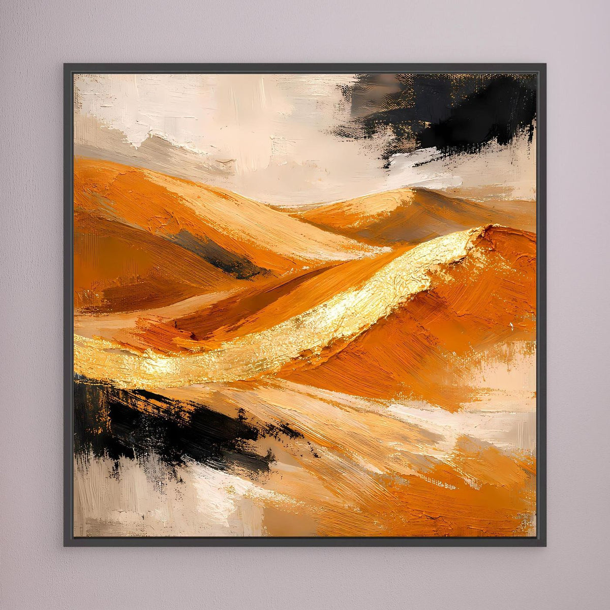 Leinwandbild mit abstrakter Dünenlandschaft in Gold und Orange, dunkler Rahmen, schwarze Akzentflecken.
