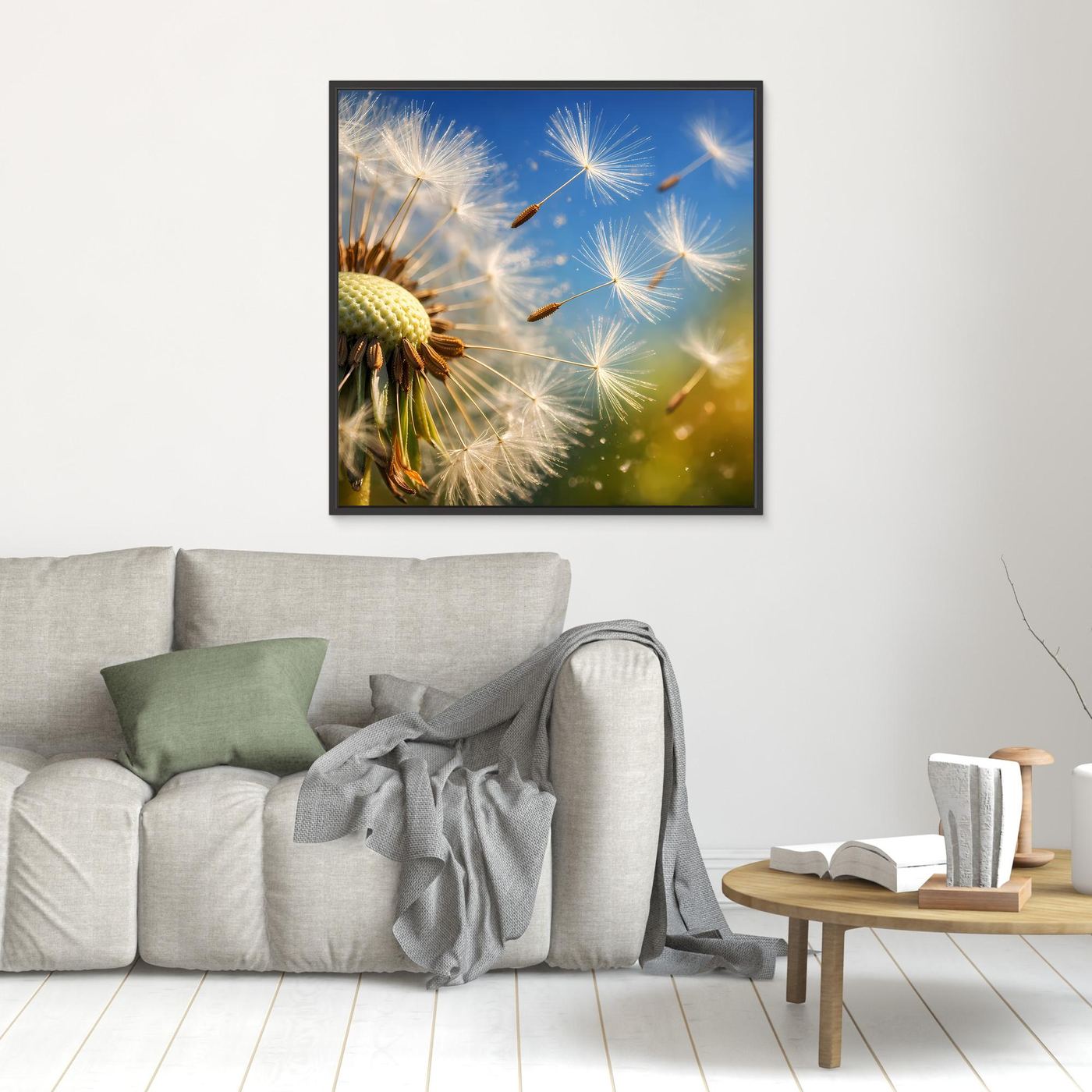 Quadratisches Leinwandbild mit fliegenden Pusteblumen und Löwenzahn, schwarzer Rahmen