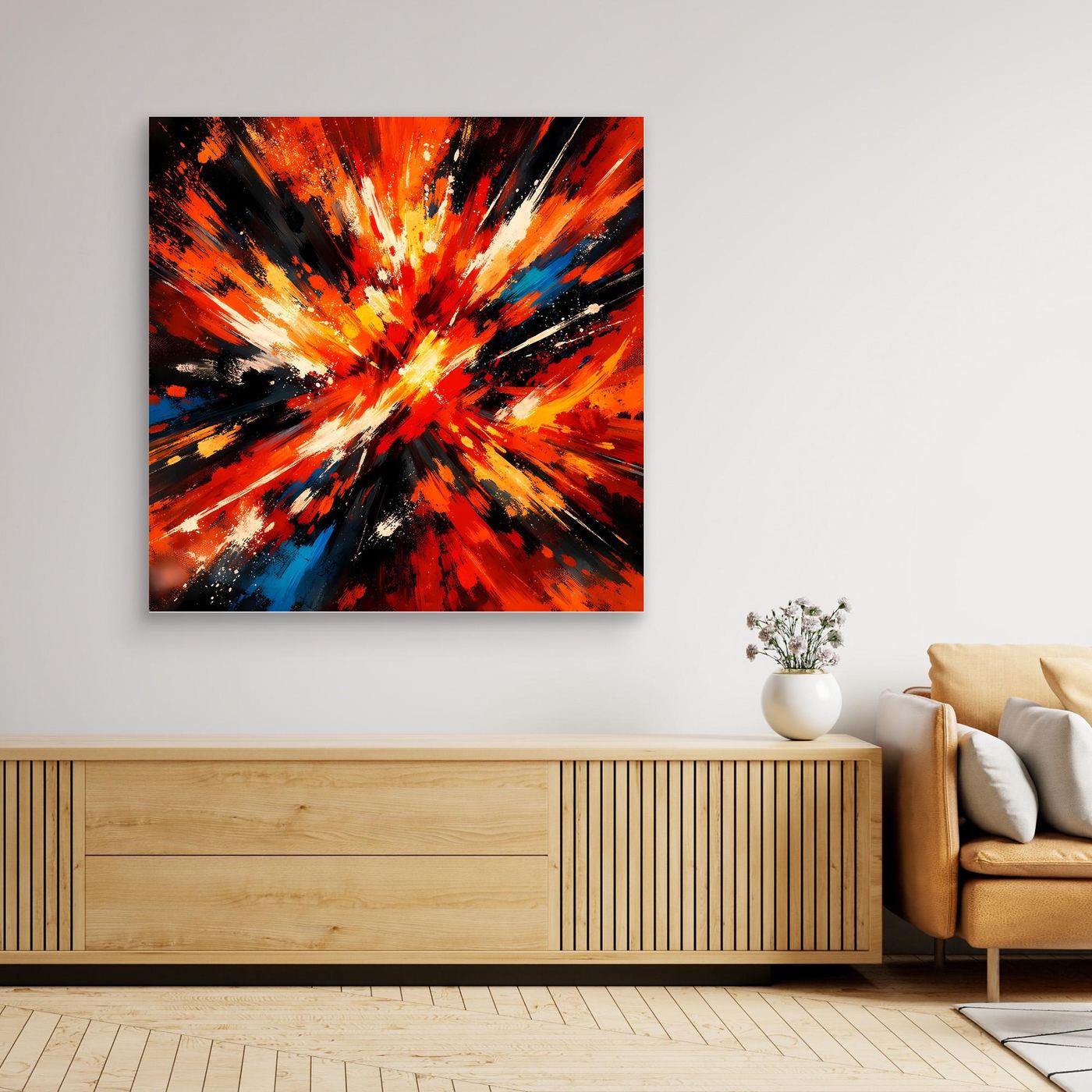 Abstraktes Leinwandbild mit hellem Holzrahmen: Farbexplosion in Rot, Orange, Gelb und Blau