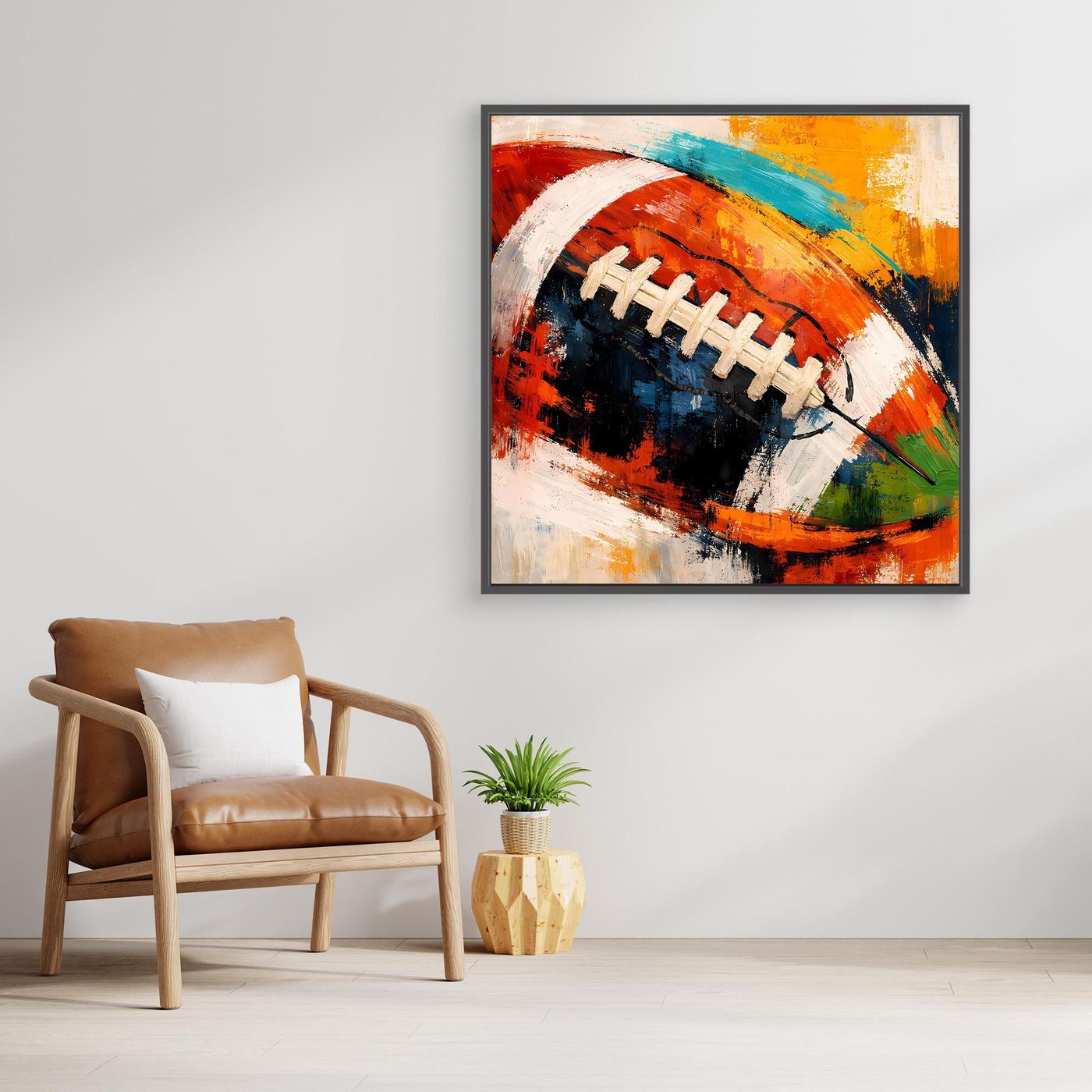 Leinwandbild mit abstraktem Football in kräftigen Farben im schwarzen Rahmen