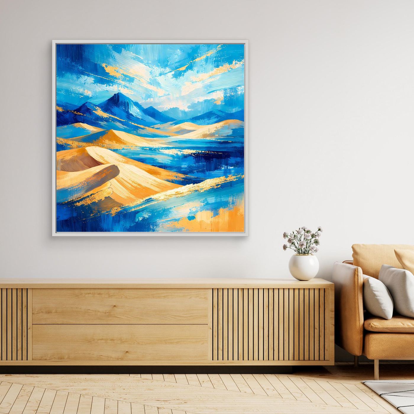 Gerahmtes Leinwandbild mit abstrakter Berglandschaft in Blau und Gold, schwarzer Rahmen