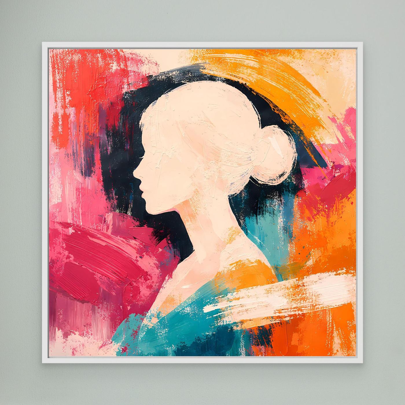 Framed canvas wall art of a woman profile silhouette in colorful abstract paint.