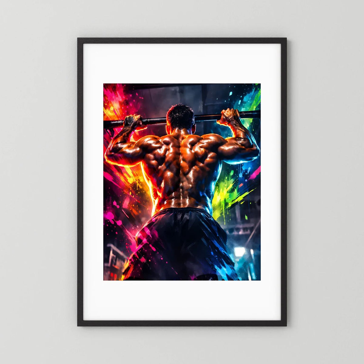 Fitness-Wandbild mit muskulösem Mann beim Klimmzug, farbige Spritzer, schwarzer Rahmen