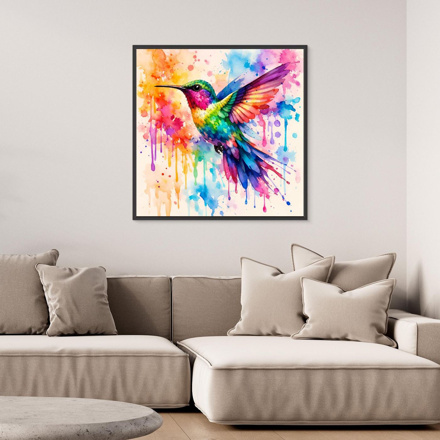 Leinwandbild Kolibri-Aquarell mit bunten Farbspritzern und Flügeln, schwarzer Rahmen