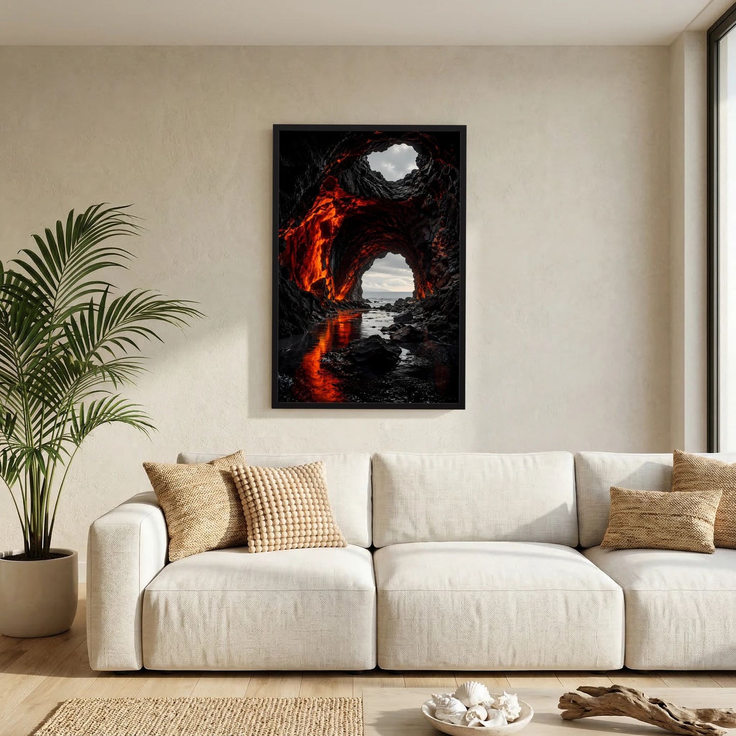 Hochformat-Poster: dunkle Lavahöhle mit Felsbögen, orange-rote Lavaflammen und Meerblick