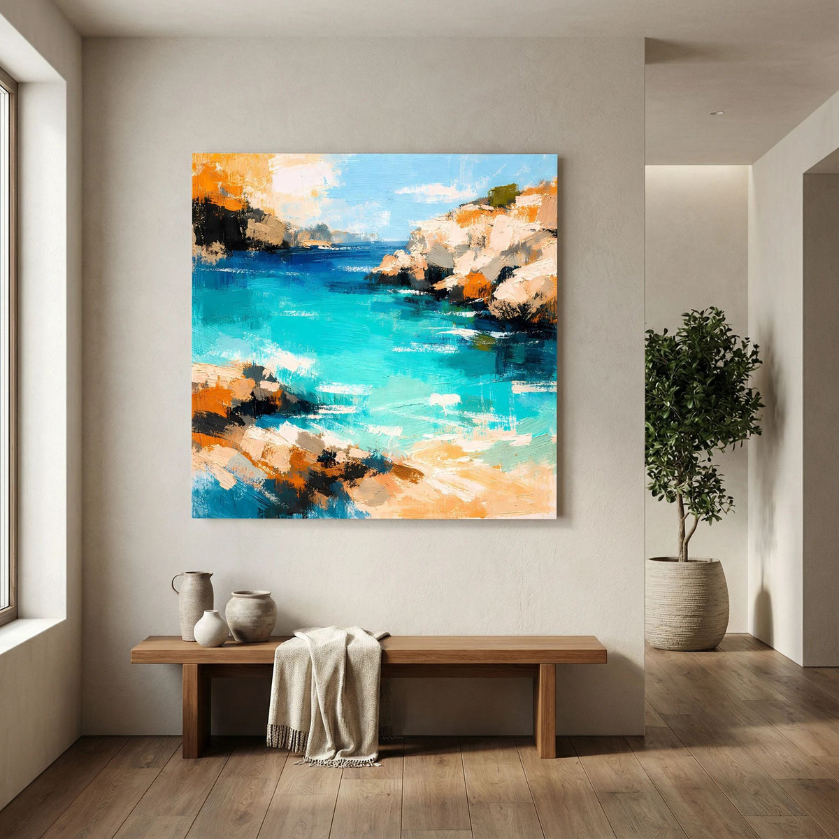 Abstraktes Küsten-Wandbild mit türkisfarbenem Wasser und orange-beigen Felsen an der Wand