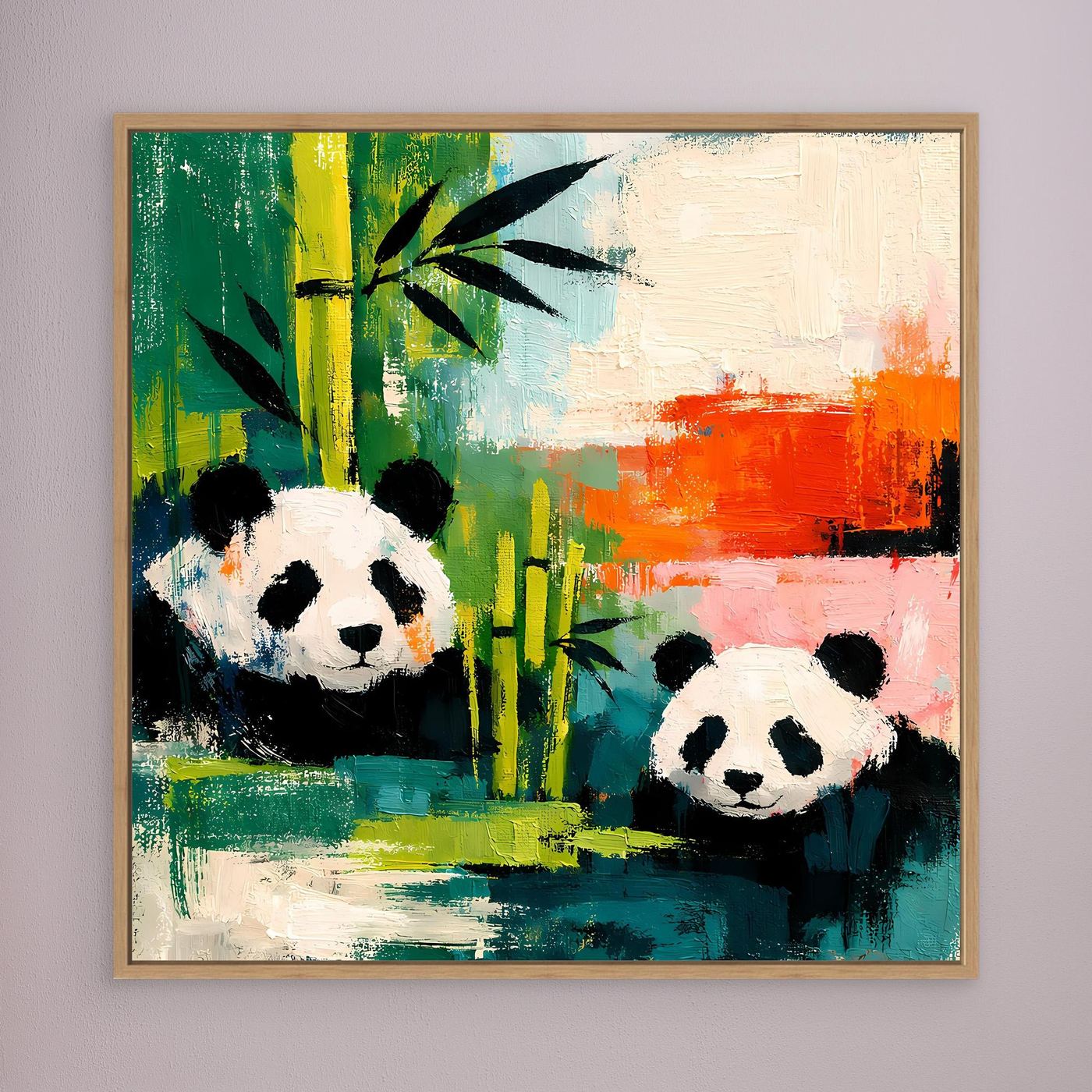 Framed canvas wall art with two pandas and bamboo in colorful abstract brushstrokes