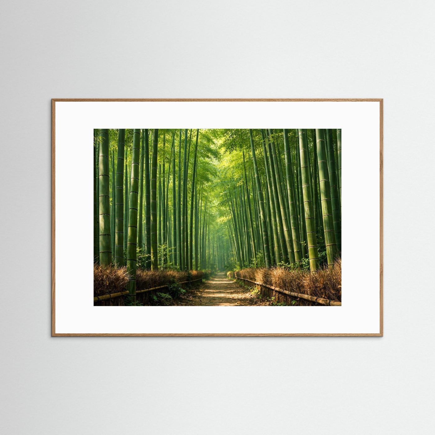 Wandbild Bambuswald im Querformat mit naturfarbenem Holzrahmen
