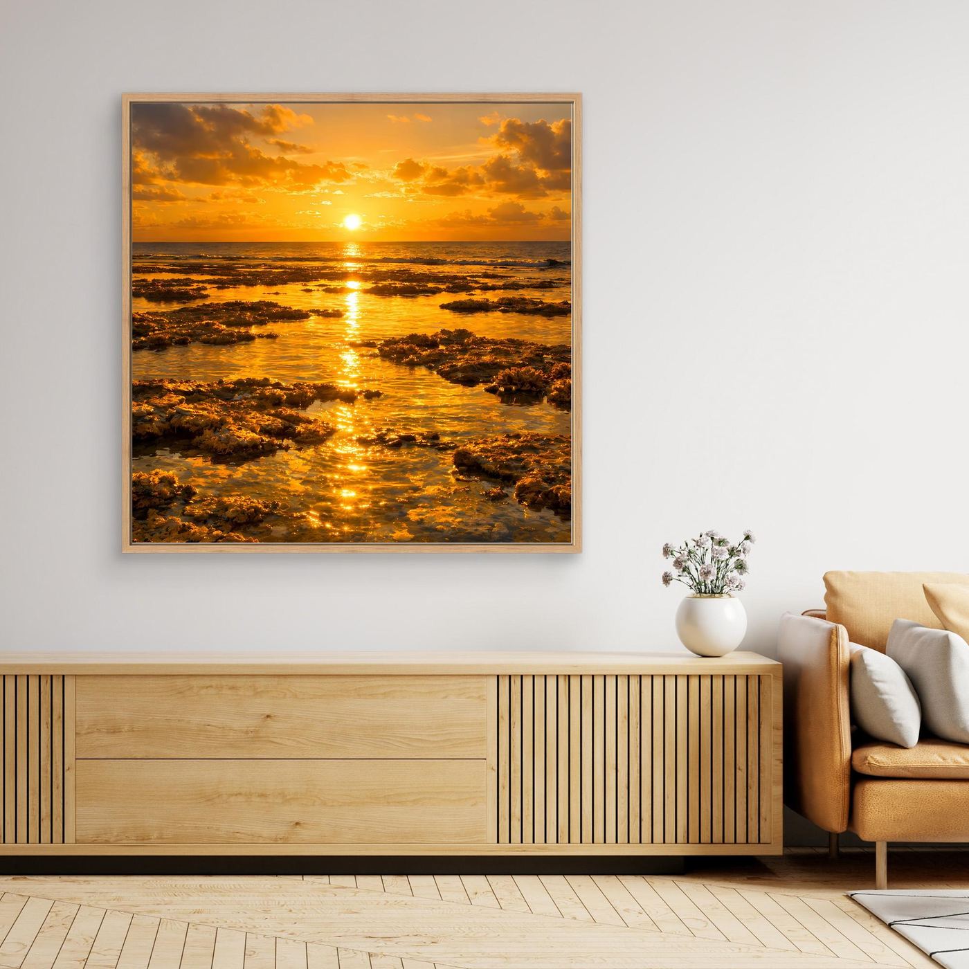 Leinwandbild Sonnenuntergang über dem Meer mit goldfarbenem Rahmen