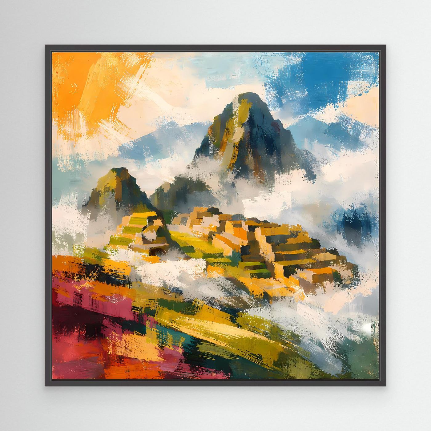 Leinwand-Wandbild mit Inka-Ruinen und Bergmassiv, Blau-Gelb-Rot, im schwarzen Rahmen.