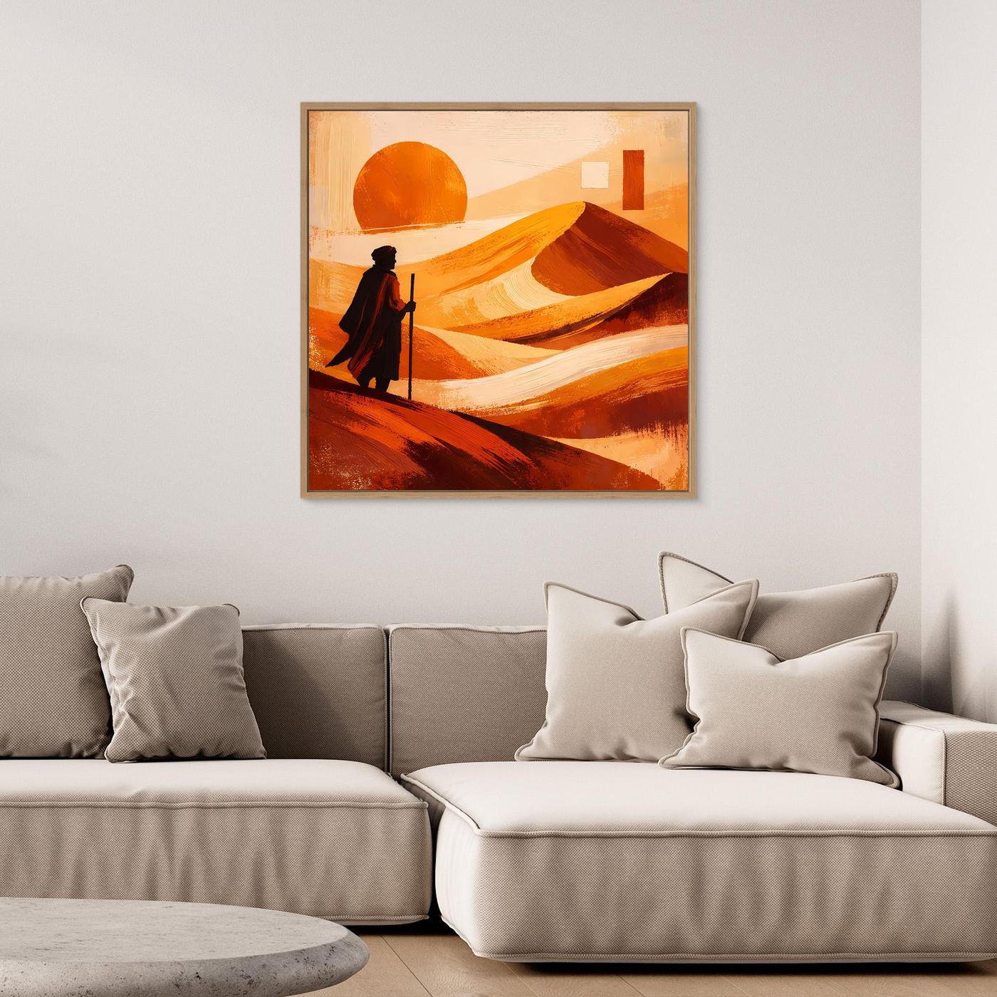 Gerahmtes Leinwandbild mit Wüstenmotiv: orange Sonne, geschwungene Sandhügel und Silhouette mit Laterne.