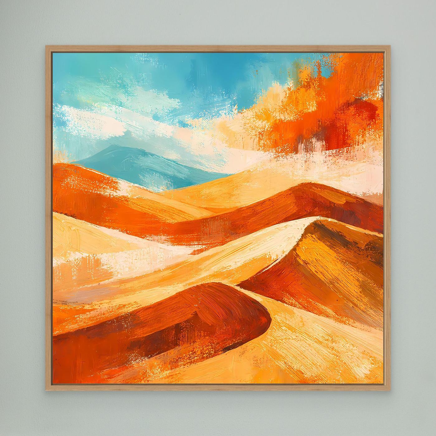 Abstract desert landscape canvas art with orange and gold dunes in an oak frame
