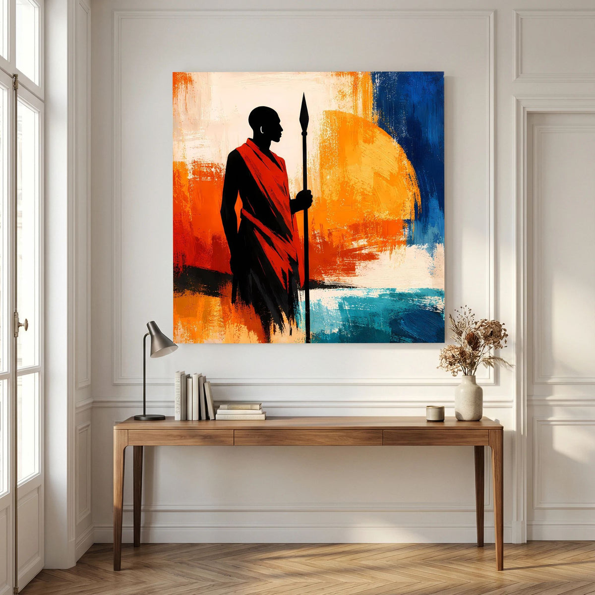 Quadratisches Wandbild: Krieger-Silhouette in Schwarz mit rotem Tuch, Speer vor Orange-Blau.