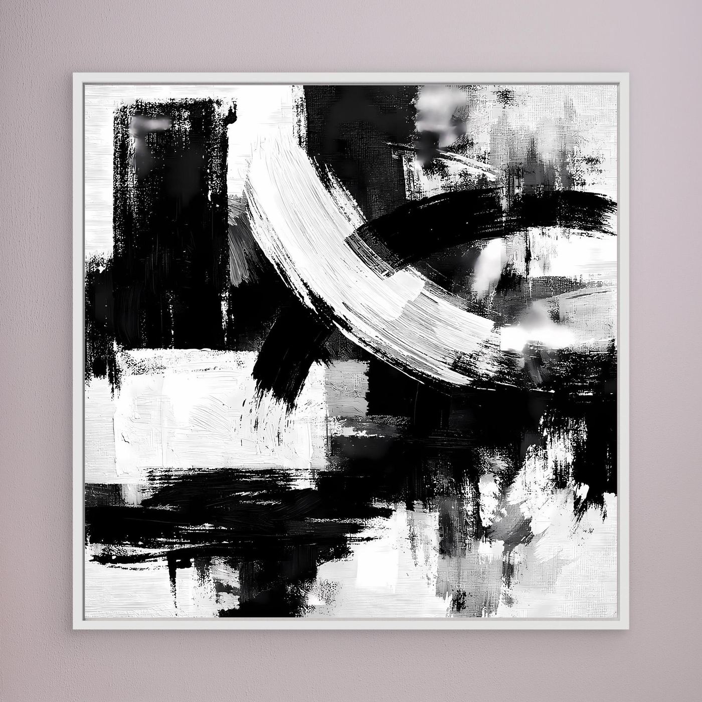 Abstract canvas wall art with black and white brush strokes, in a white frame