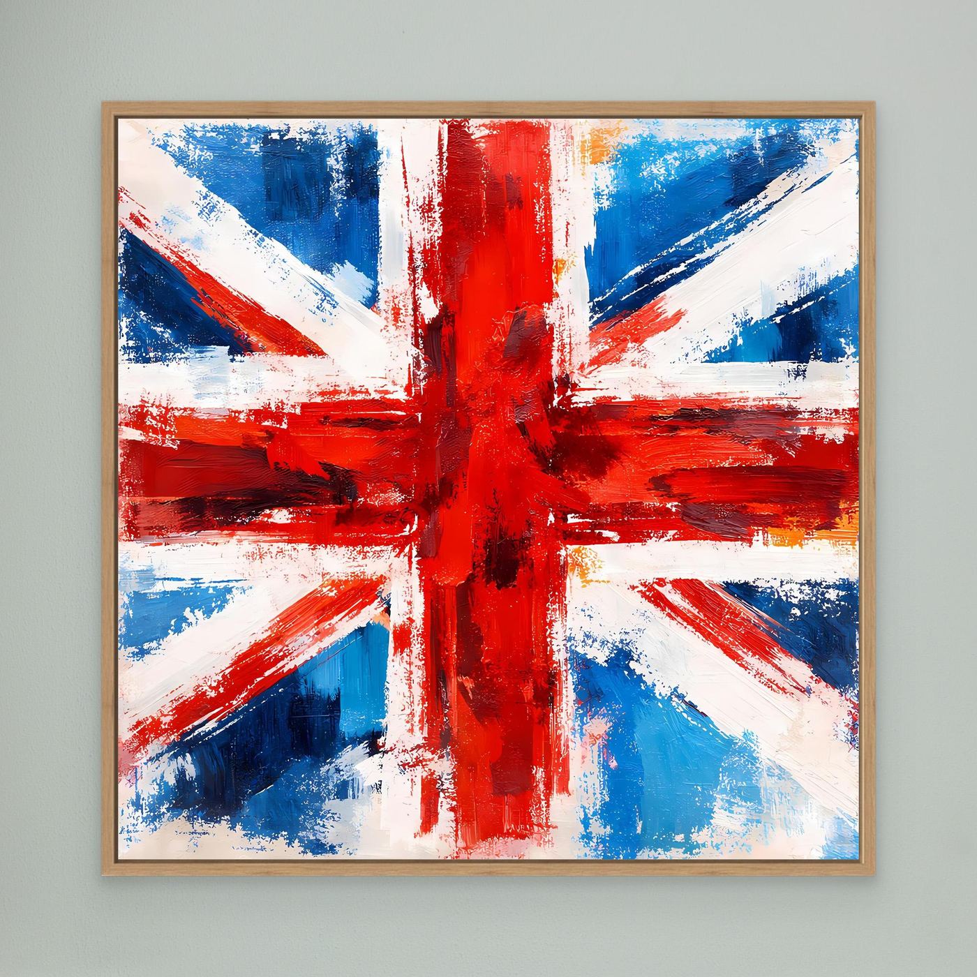 Abstract Union Jack canvas wall art with blue, red, and white brush strokes, oak frame