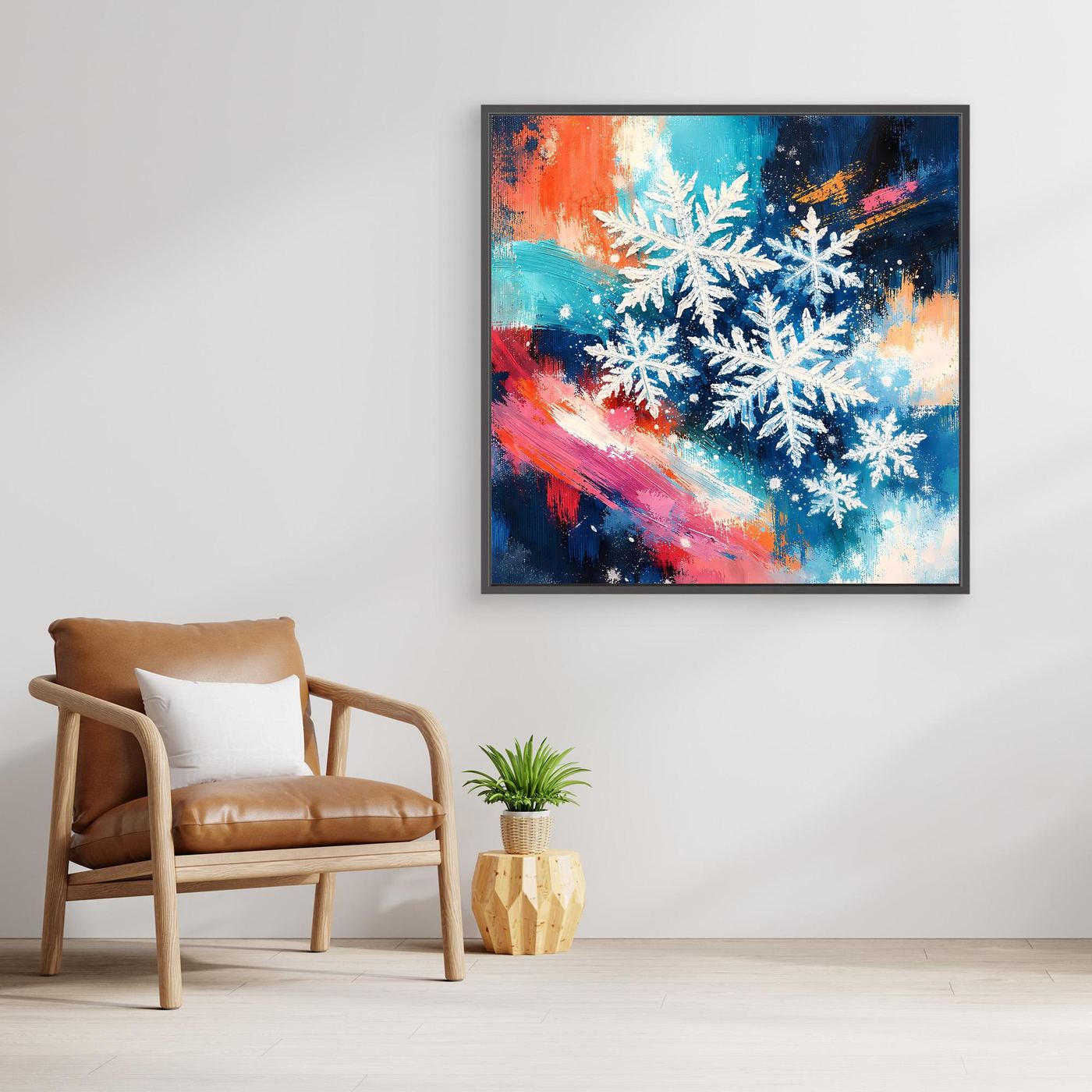 Leinwand-Wandbild mit abstrakten weißen Schneeflocken auf blau-orangen Farbflächen, dunkler Rahmen
