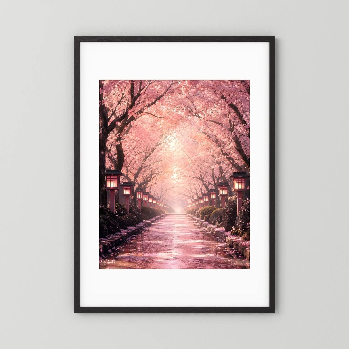 Hochformat-Wandposter mit Kirschblütenallee in Rosa, schwarzer Rahmen mit Weißrand