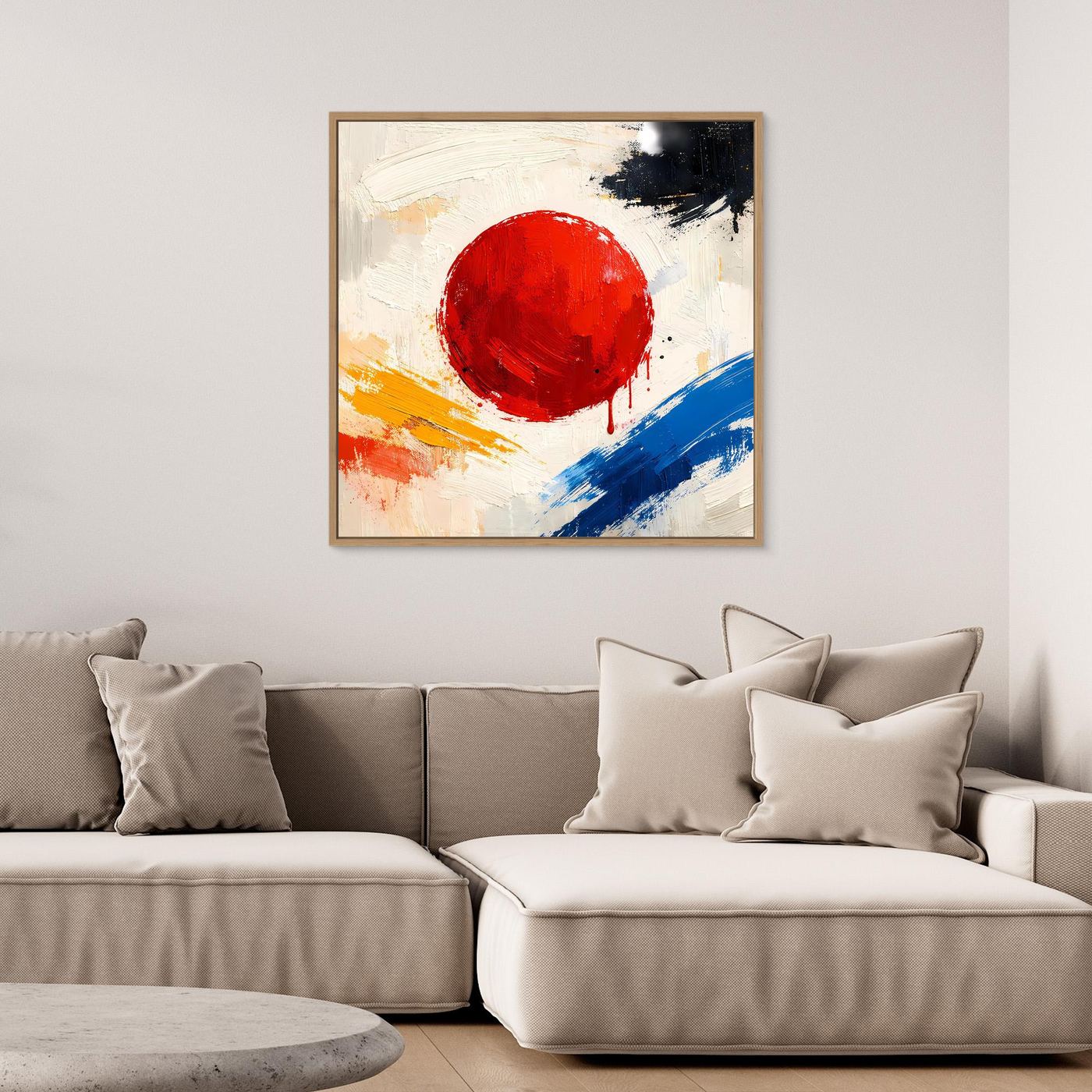 Framed abstract canvas wall art with red circular sun and blue diagonal brushstroke on white.