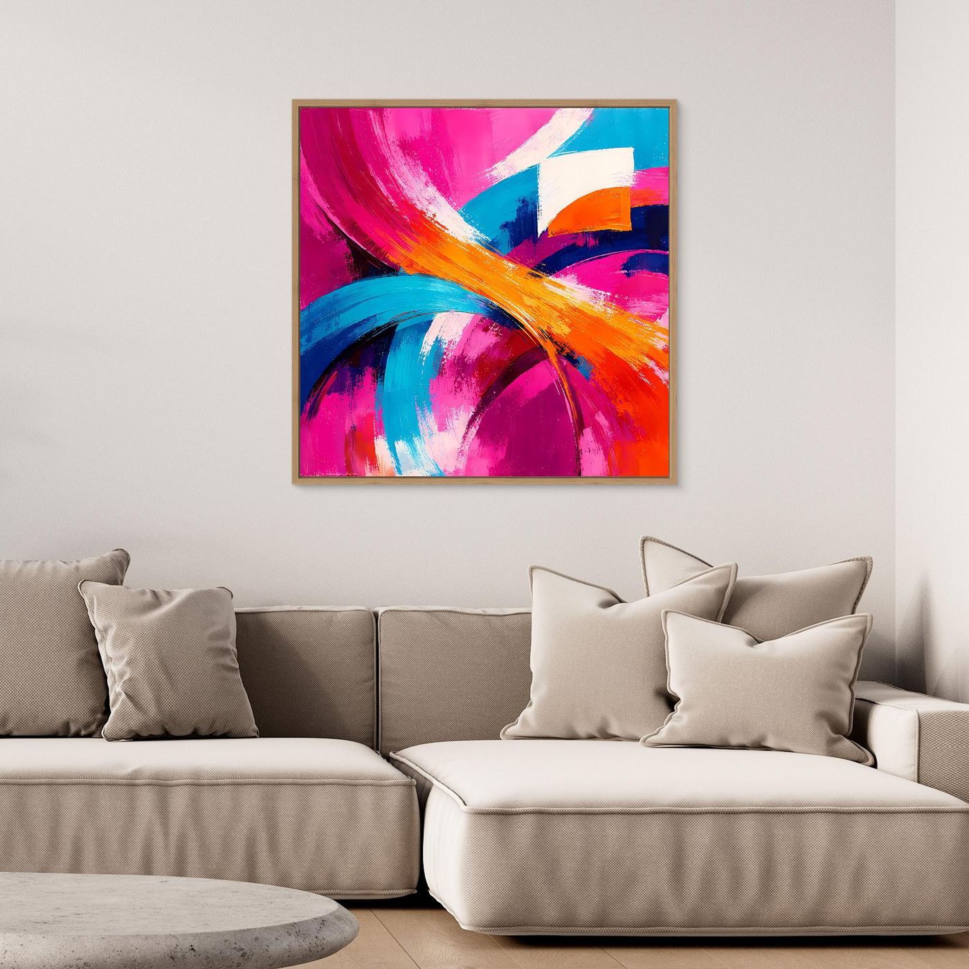 Abstraktes Leinwandbild mit farbigen Schwüngen in Pink, Blau und Orange, im Rahmen