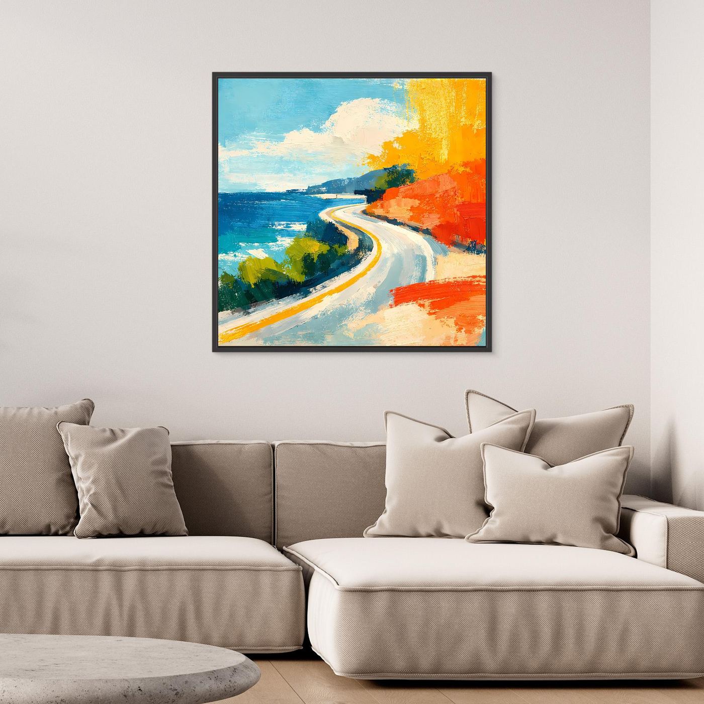 Coastal road abstract wall art with black frame, blue sea and orange coast with winding road.