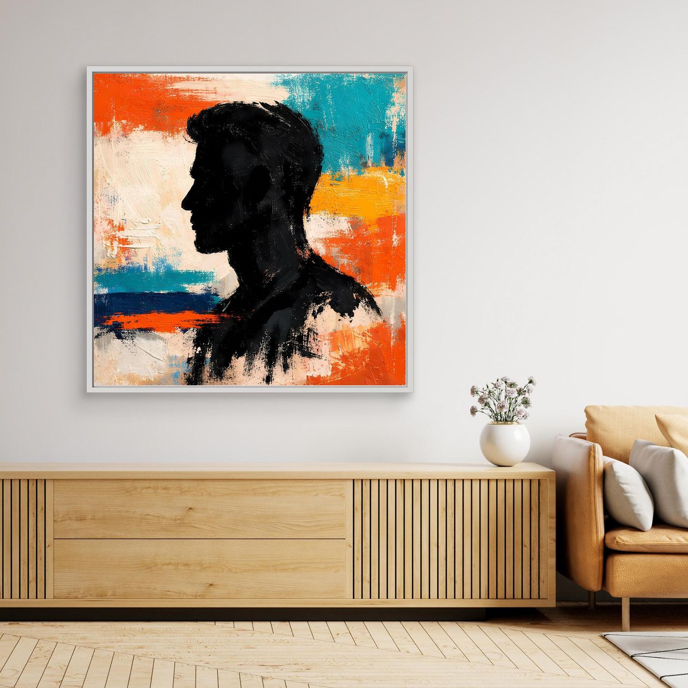 Abstract male portrait canvas wall art, black silhouette on orange teal background, light frame
