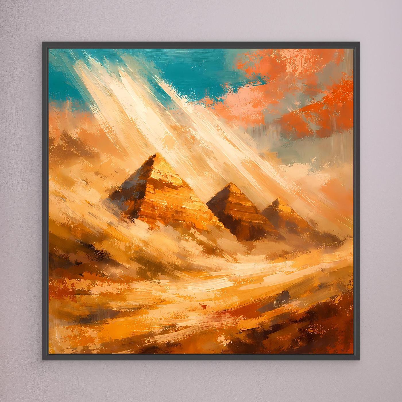 Leinwand-Wandbild mit abstrakten Pyramiden in warmen Orange- und Blautönen, schwarzer Rahmen