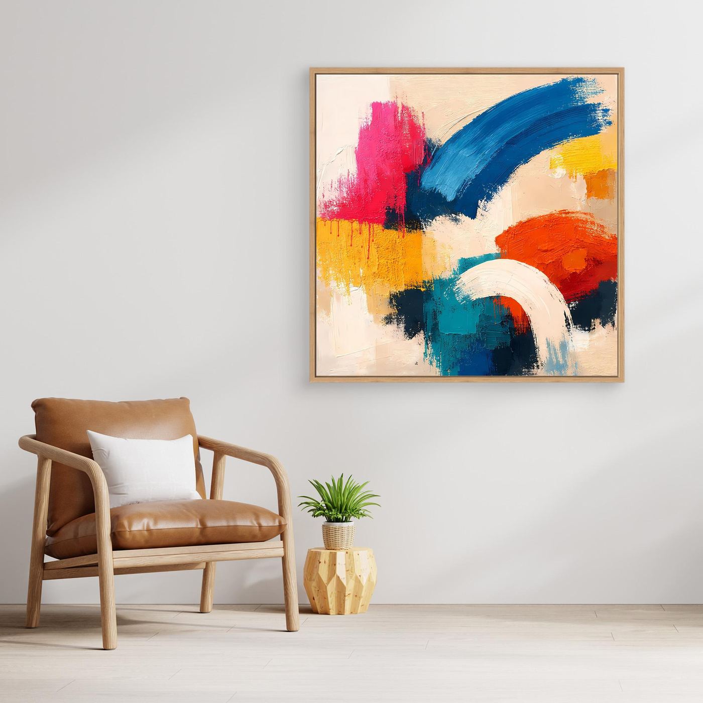 Abstract canvas wall art with colorful brushstrokes in a light wood frame