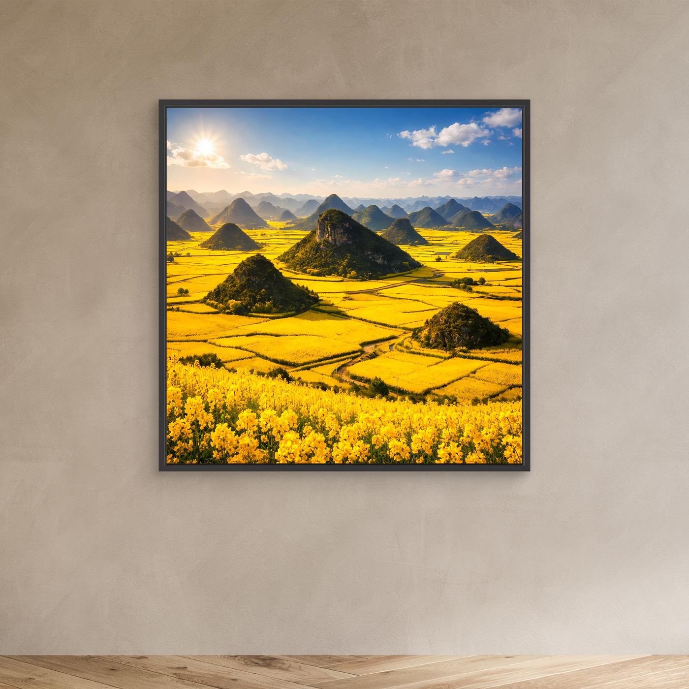 Leinwandbild mit goldenem Rapsfeld und Karstbergen, schwarzer Rahmen