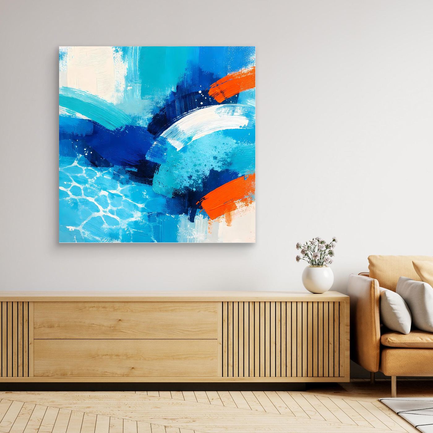 Framed abstract canvas wall art with blue ocean waves and orange paint swashes