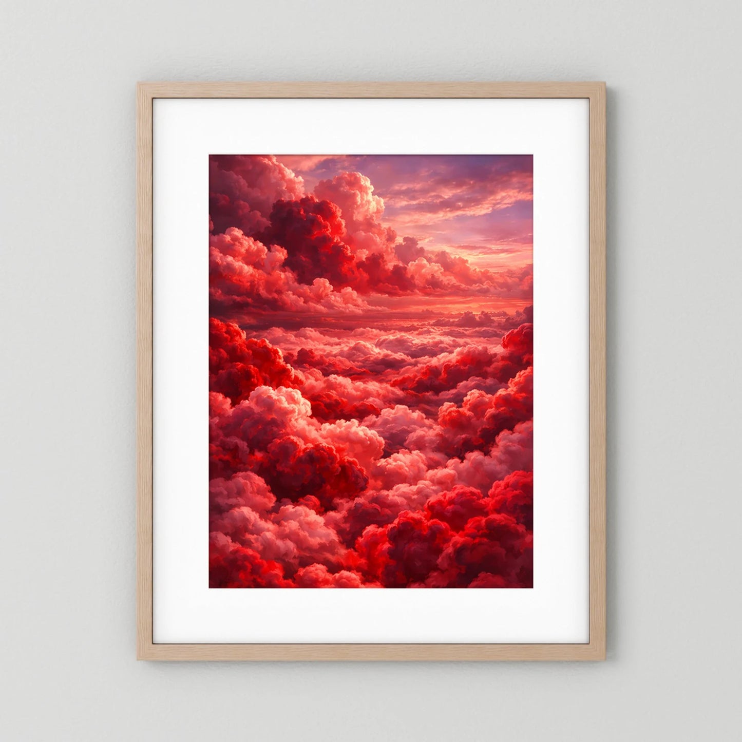 Kunstposter Hochformat mit hellem Holzrahmen und weißem Passepartout, rote Wolken