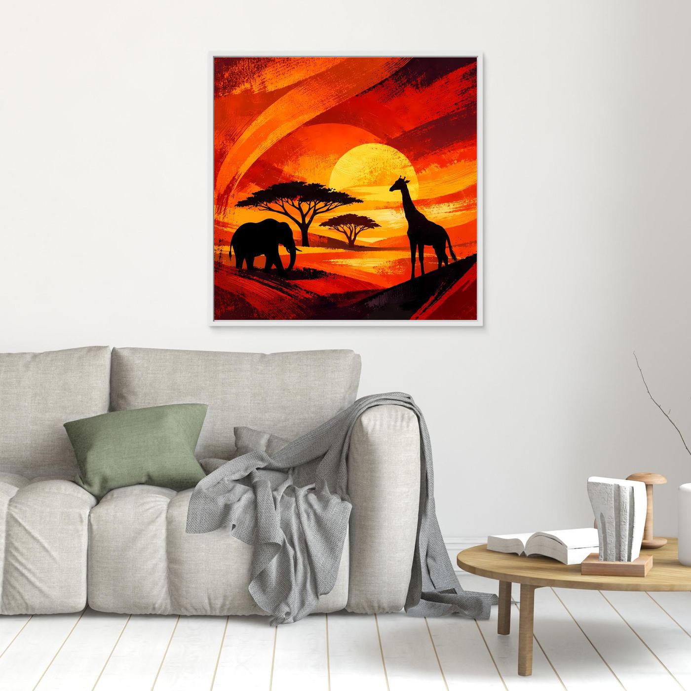 Gerahmtes Leinwandbild: dunkle Elefant- und Giraffensilhouetten vor orangefarbenem Sonnenkreis