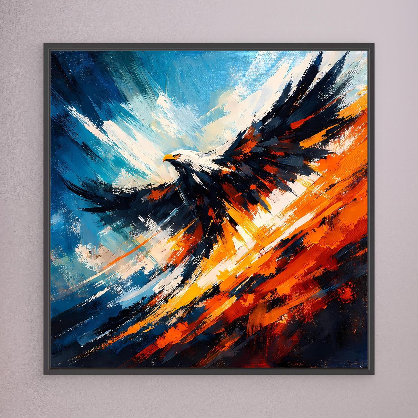 Wandbild mit abstraktem Adler in Blau, Orange und Schwarz, schwarz gerahmt