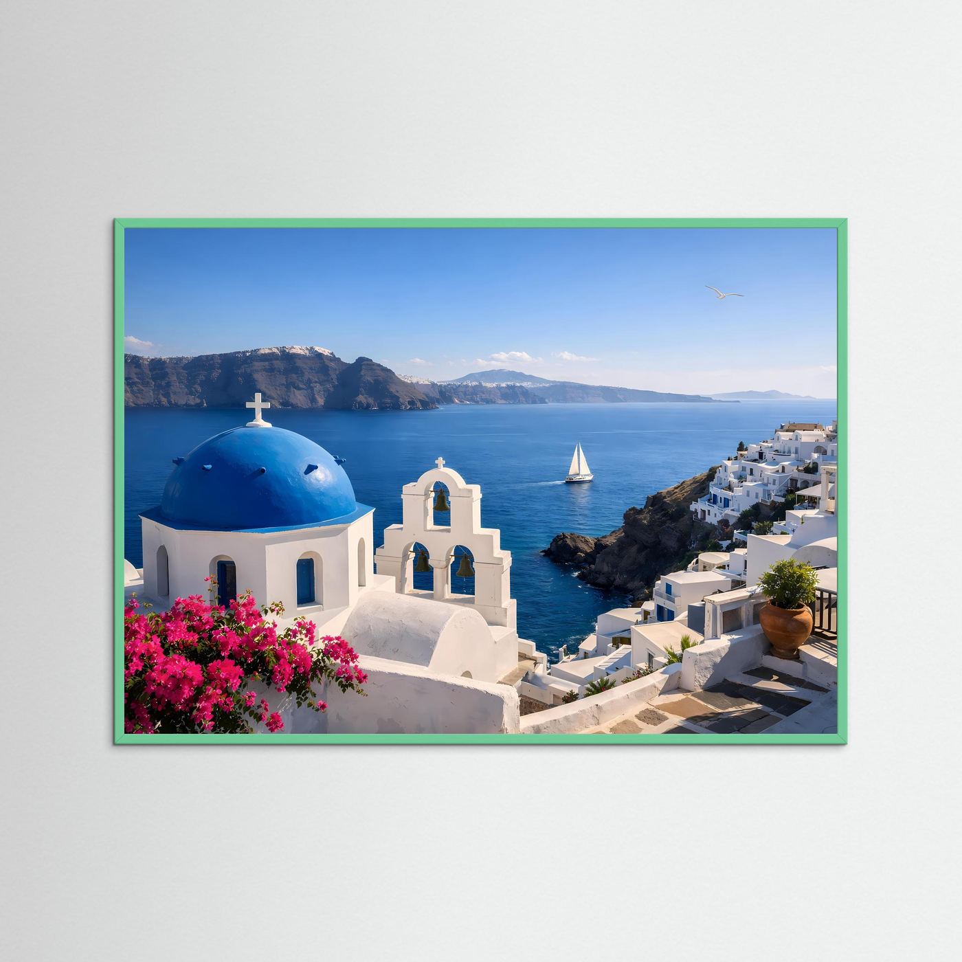 Poster Querformat: blaue Kuppelkirche, Meer und weiße Häuser mit pinken Blüten im grünem Rahmen.