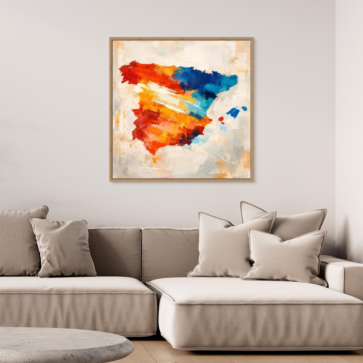 Abstract Spain map canvas wall art with oak frame, red orange and blue on light ground.