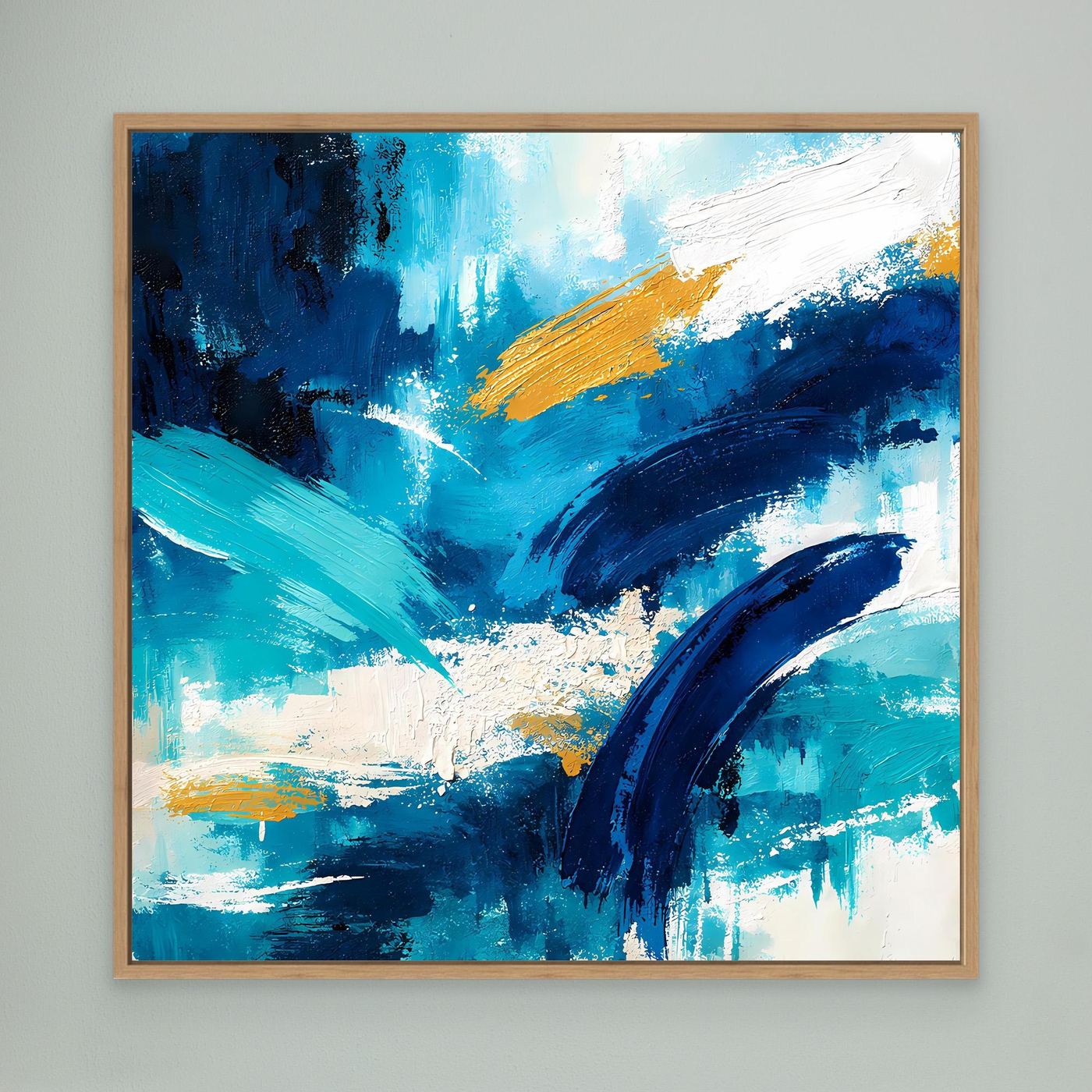 Abstract blue and teal canvas wall art with gold diagonal stripe in an oak frame