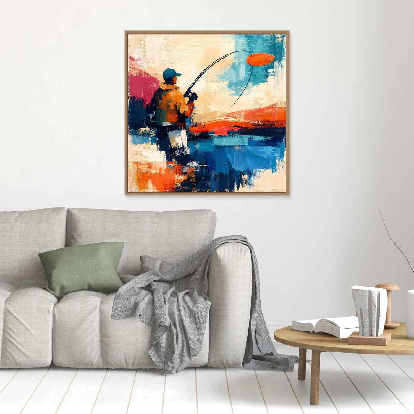Abstract canvas wall art of an angler holding a fishing rod; orange, blue, and red; wood frame.