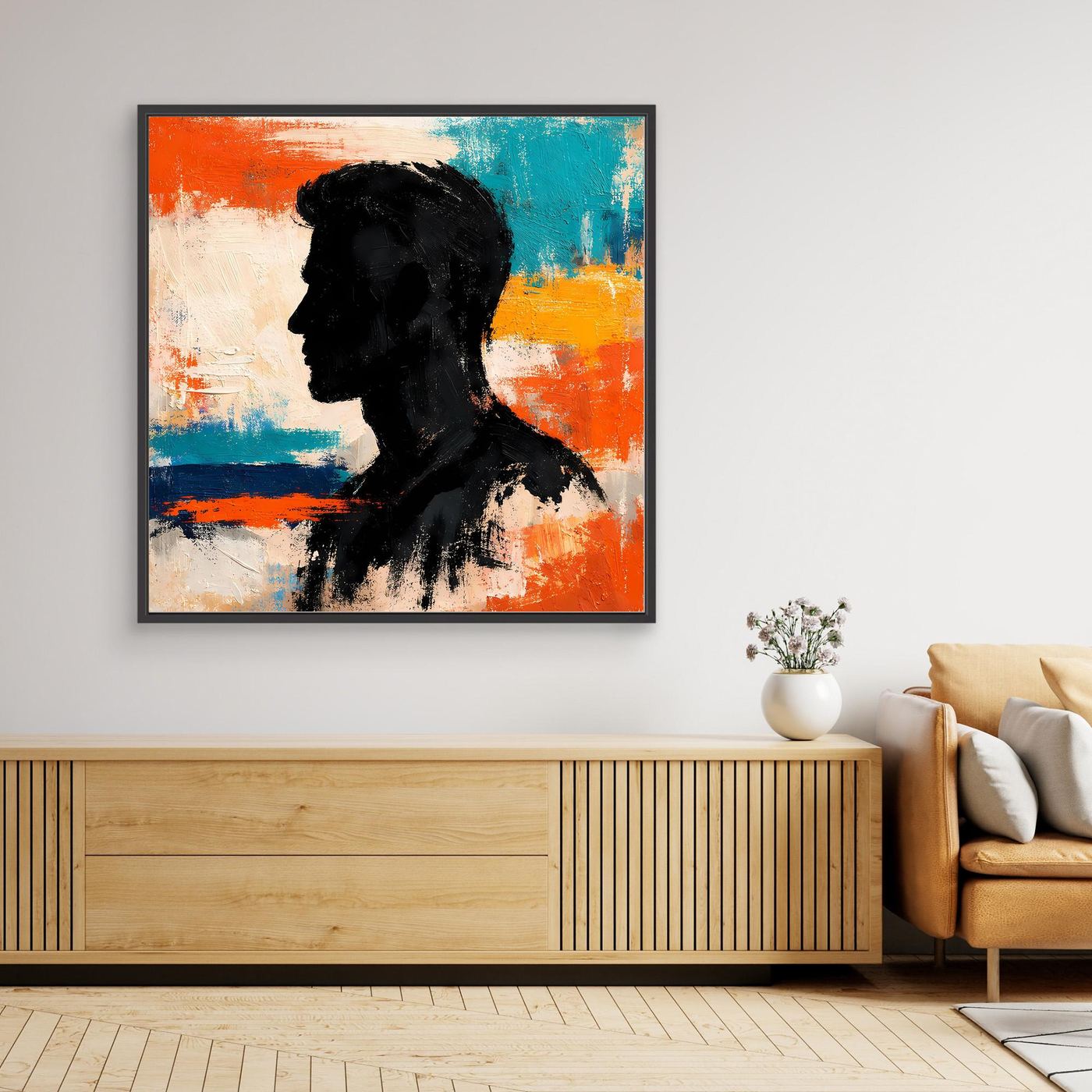Abstract male portrait canvas wall art, black silhouette on orange teal background, dark frame