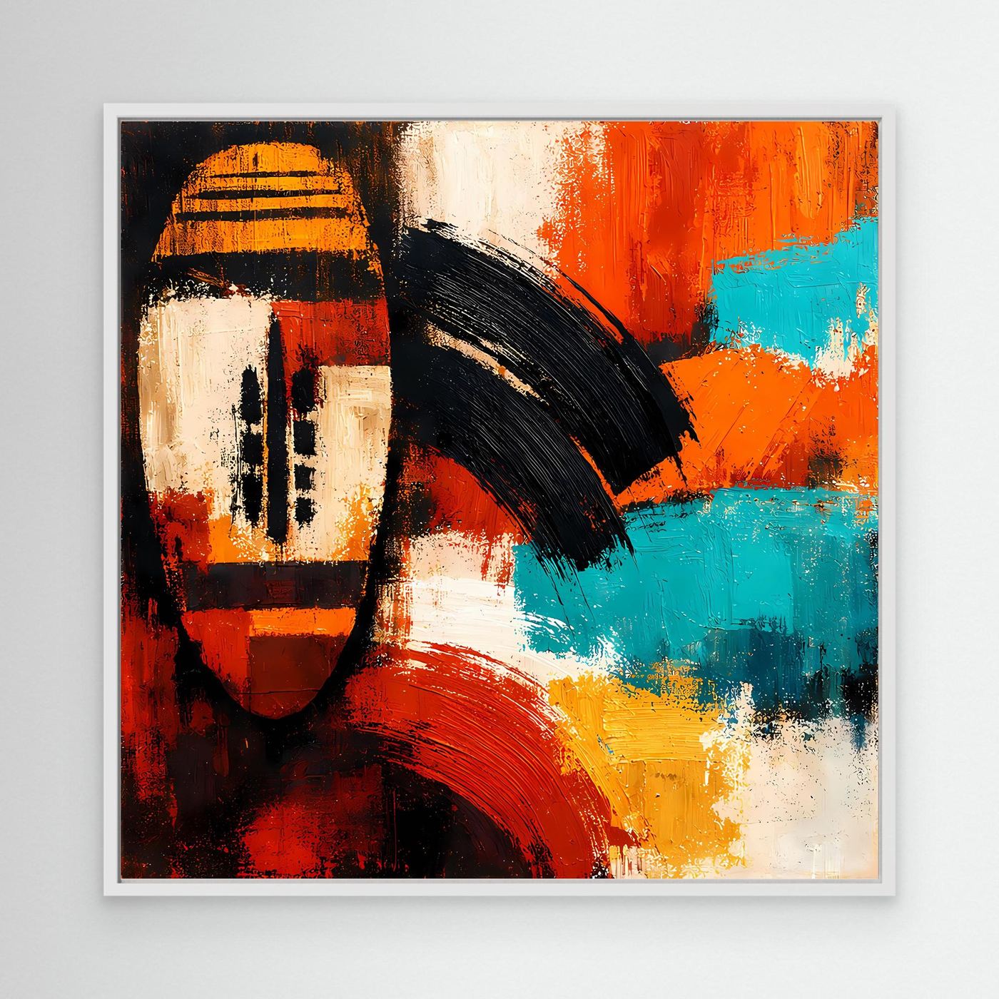 Abstract canvas wall art of an African mask with red, orange, teal and white tones in white frame