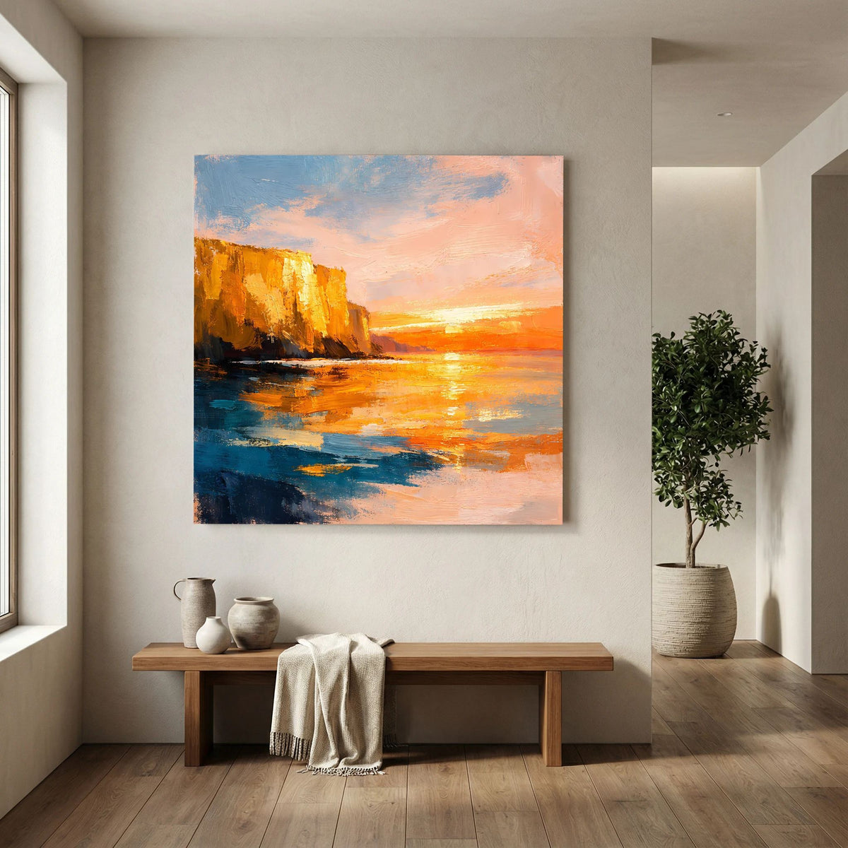 Leinwand-Wandbild zeigt Küstenlandschaft in Farben: orangefarbener Himmel, blaues Meer, Felswand