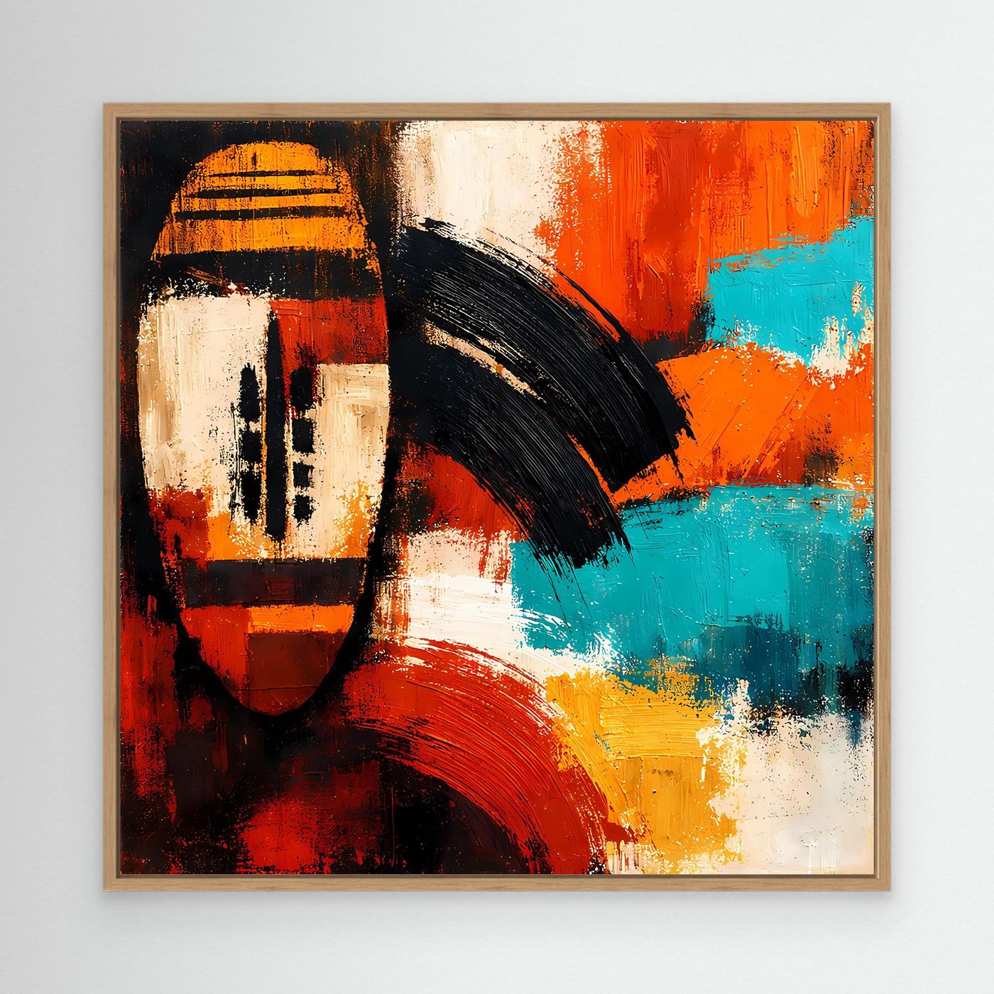 Abstract canvas wall art of an African mask with red, orange, teal and white tones in oak frame