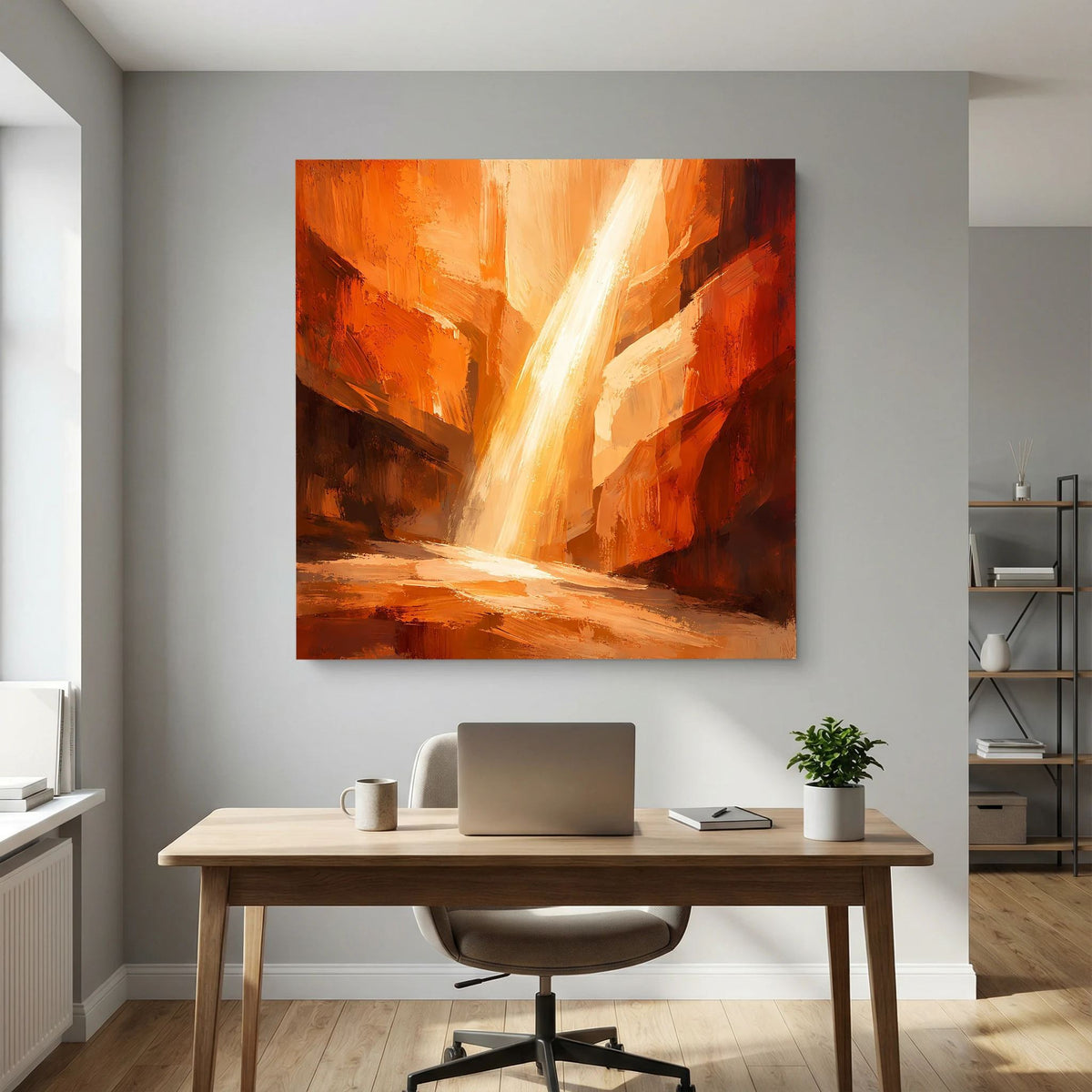 Gerahmtes Leinwandbild mit warmen Orange- und Brauntönen sowie hellem Lichtstrahl