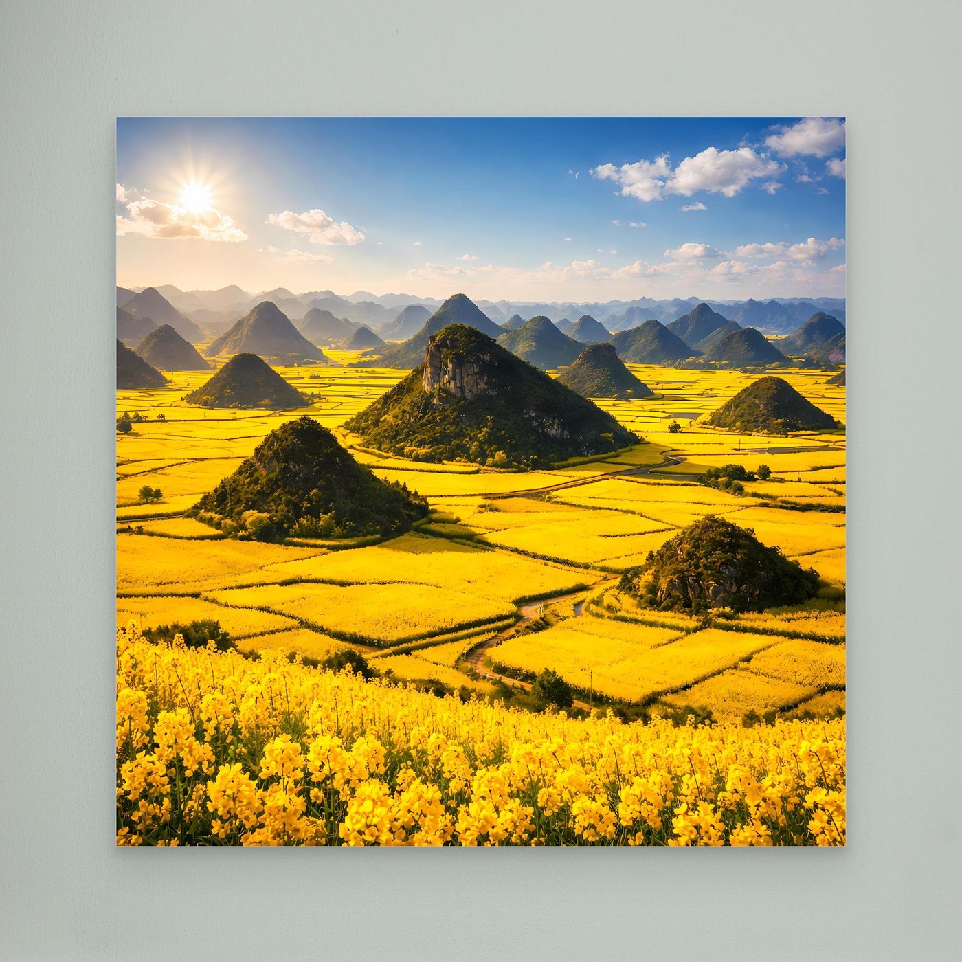 Leinwandbild mit goldenem Rapsfeld und Karstbergen, weißer Rahmen