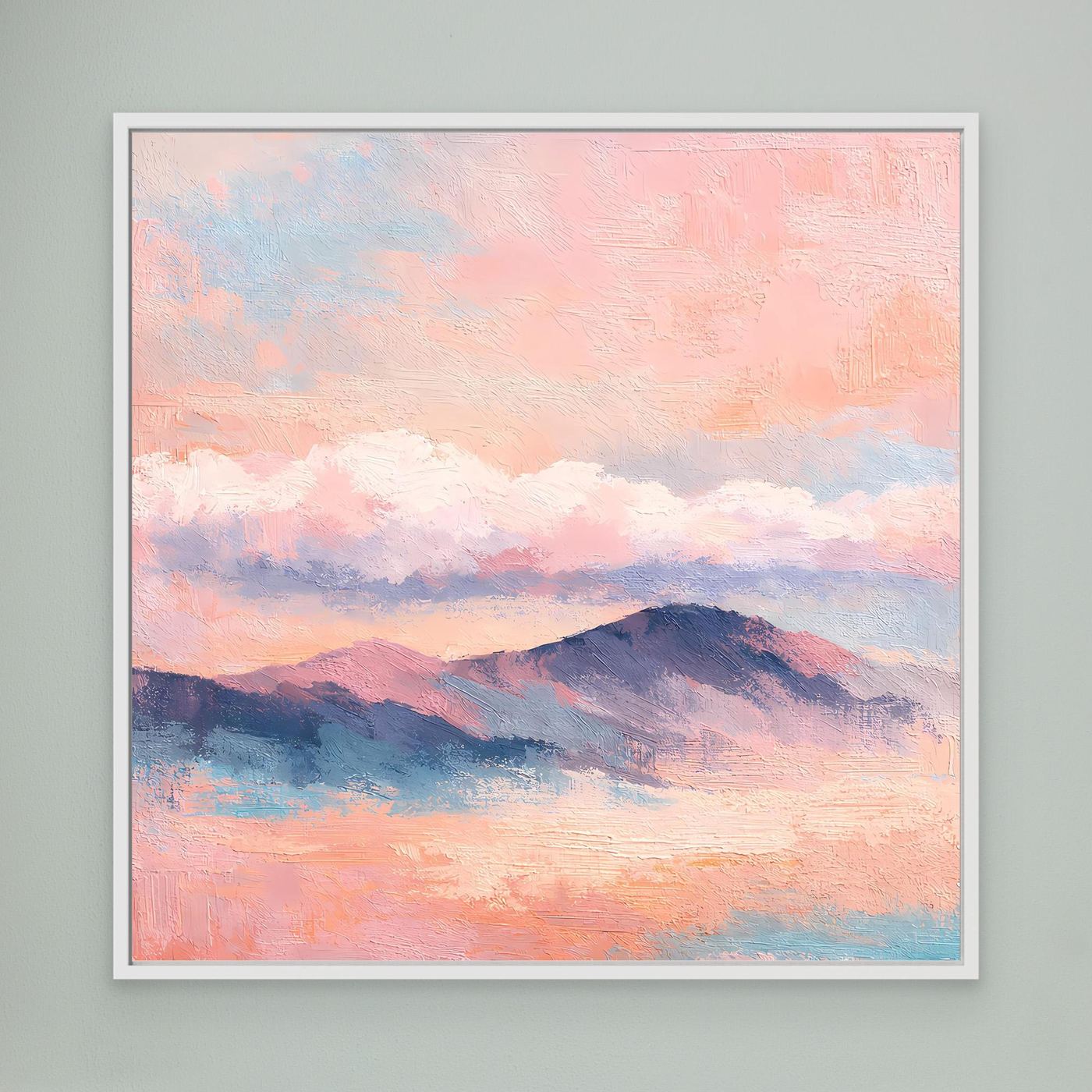 Leinwand-Wandbild mit Pastell-Bergkette und Wolken am Sonnenuntergang, weiß gerahmt