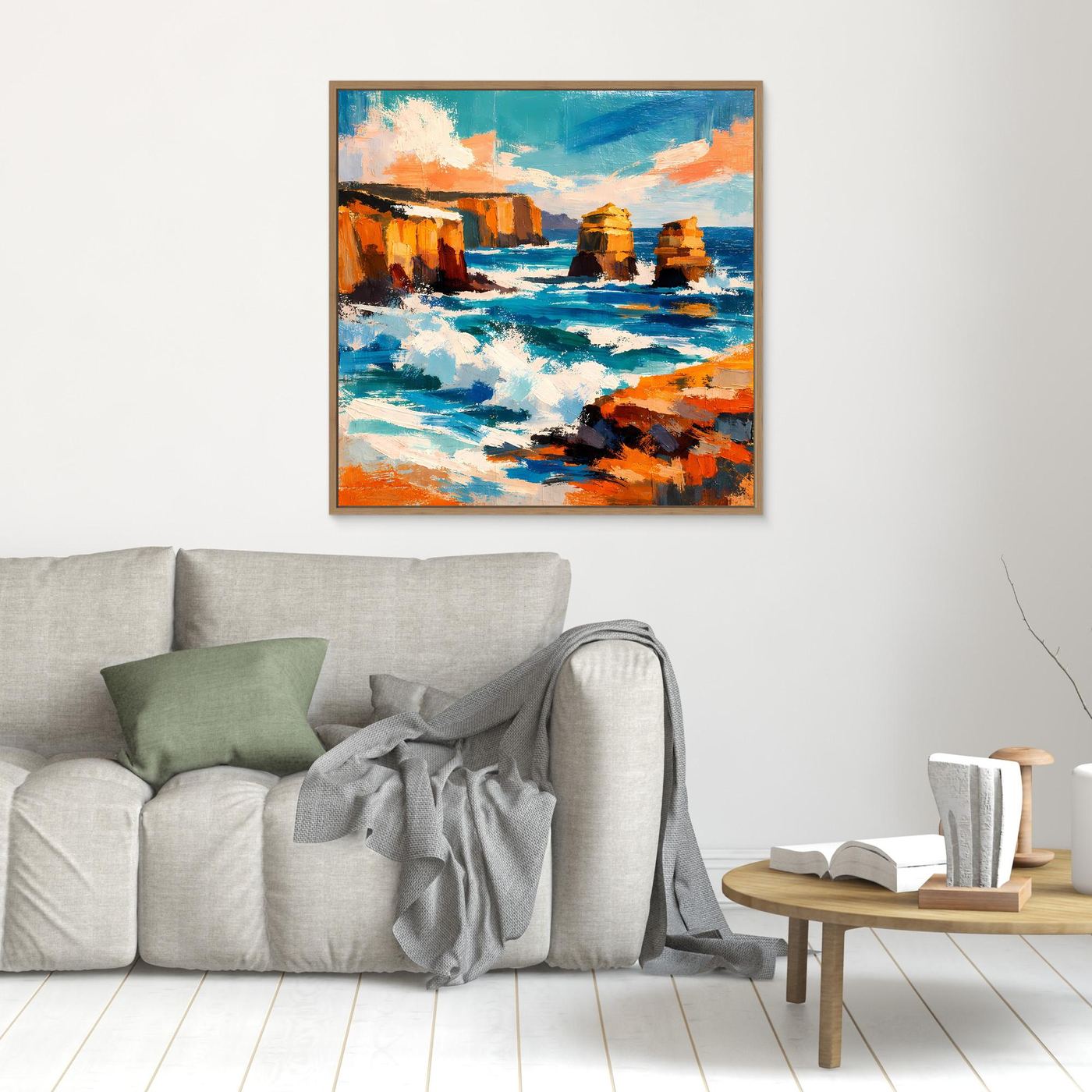 Kleines Wandbild mit abstraktem Küstenmotiv: türkisblaues Meer, orange Felsen, Holzrahmen